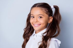 Young girl smiling | Dental Health
