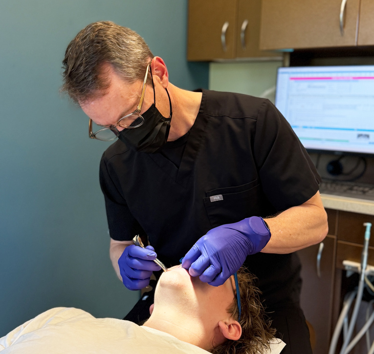 Dr. Halgren with patient - Halgren Orthodontics