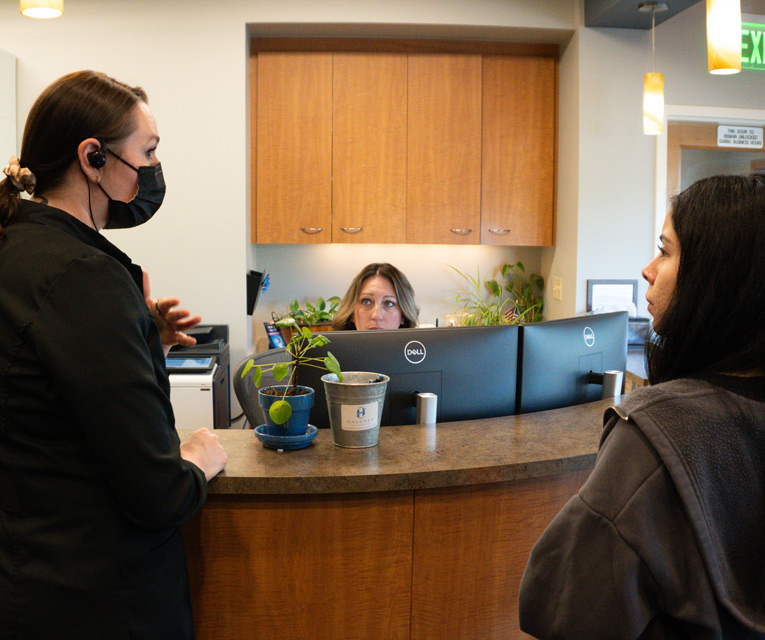Patient speaking with Halgren team | Halgren Orthodontics in Mt Vernon and Orcas Island, WA